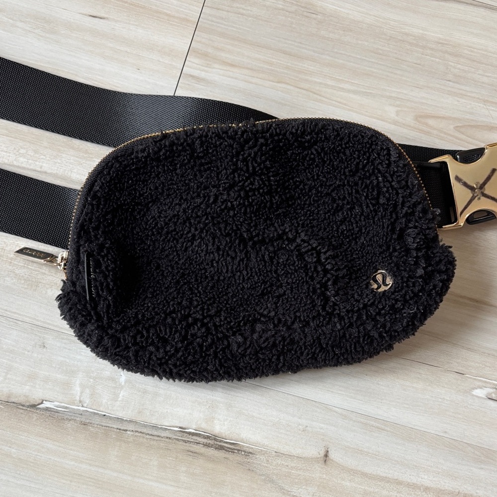 lululemon athletica Black Sherpa Belt Bag with Gold Hardware